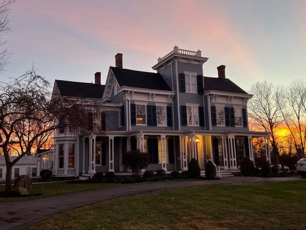 sunset over historical building painted by the ohio painting company