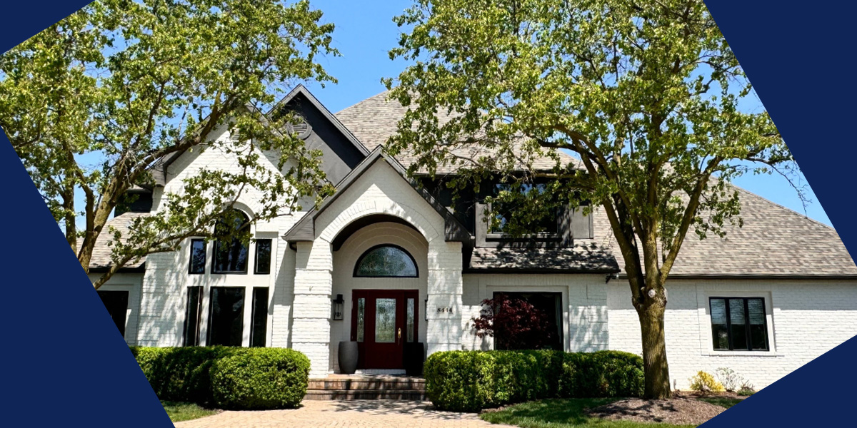 a white brick house painted with romabio masonry flat