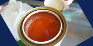 a picture of an old can of paint that has separated
